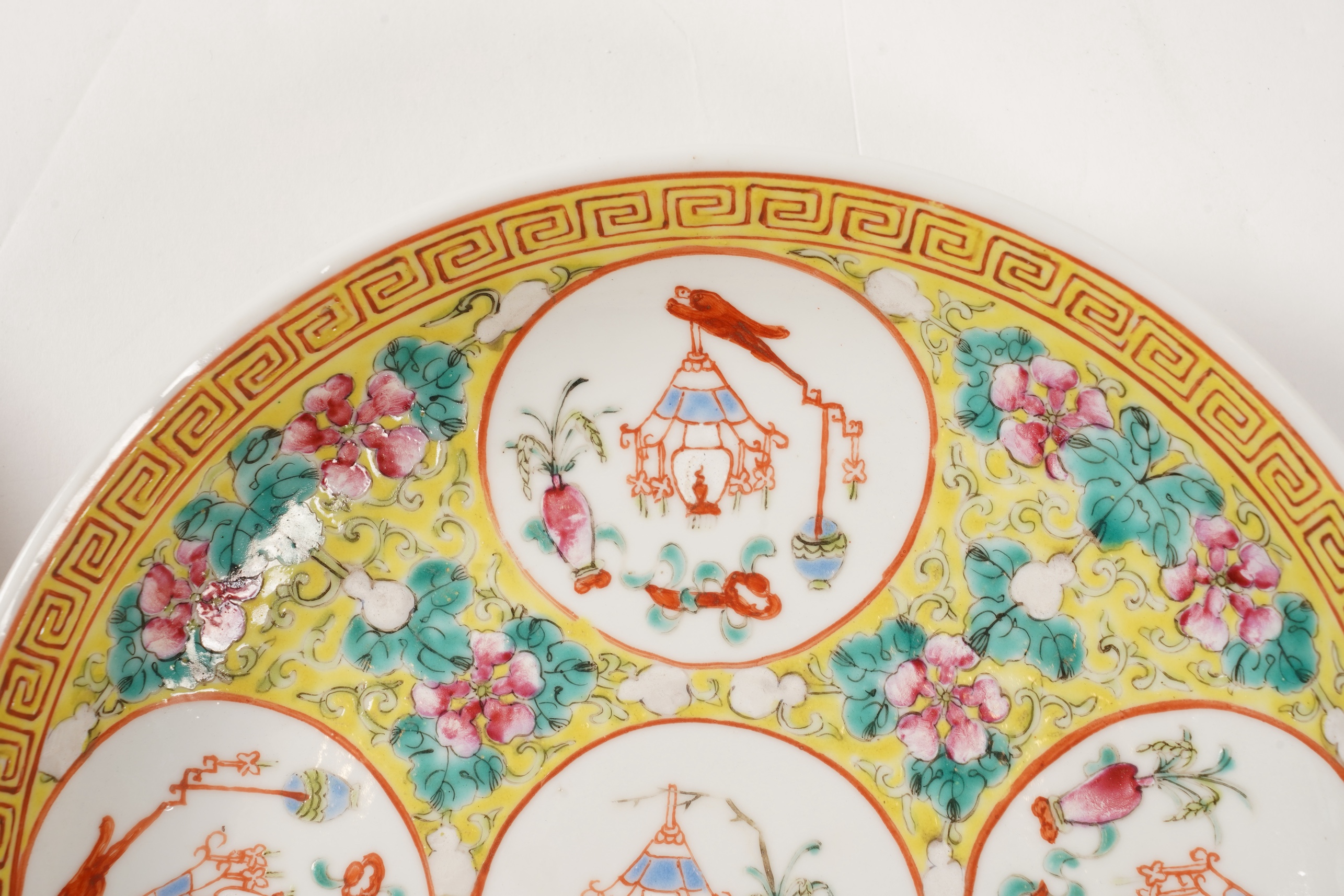 A pair of Chinese yellow ground medallion saucer dishes, Guangxu six character marks, early 20th century